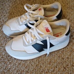 New Balance Classic White and Black Sneakers